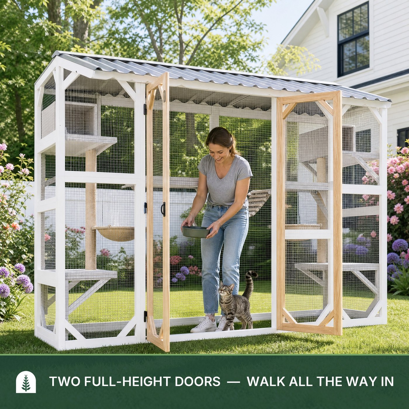 A woman standing upright inside the Catio CW01 with both full-height doors open